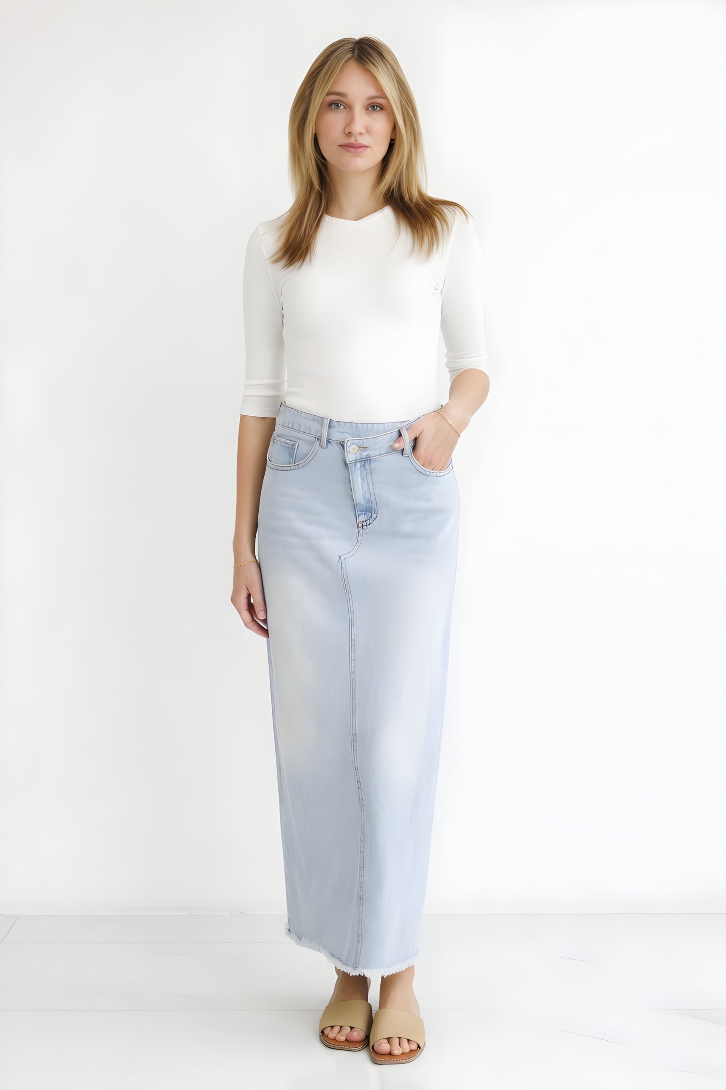 DENIM SKIRT WITH ASYMMETRICAL FLY DETAIL