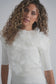 IVORY VEST WITH SOFT FLOWERS
