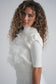 IVORY VEST WITH SOFT FLOWERS