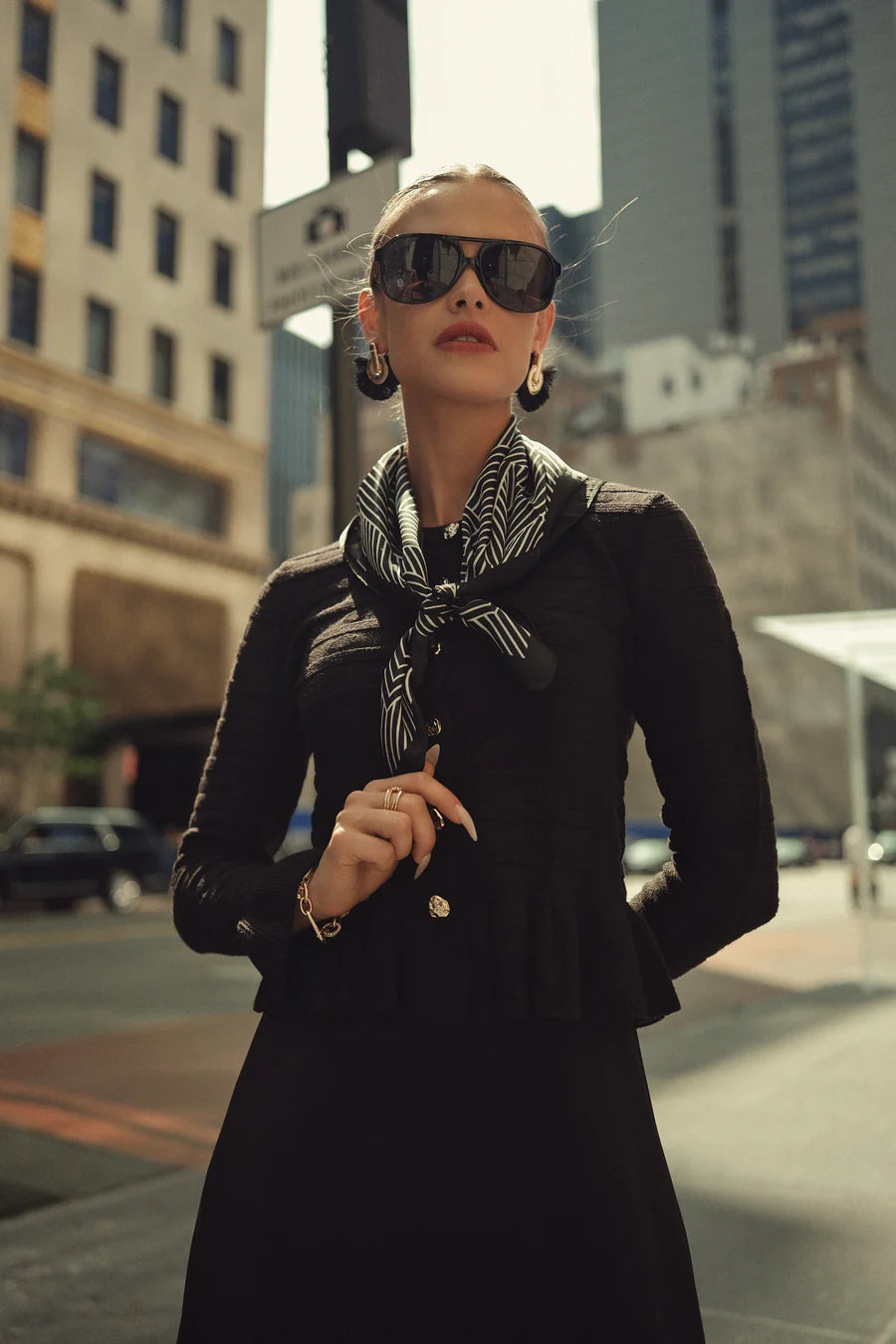 BLACK PEPLUM CARDI