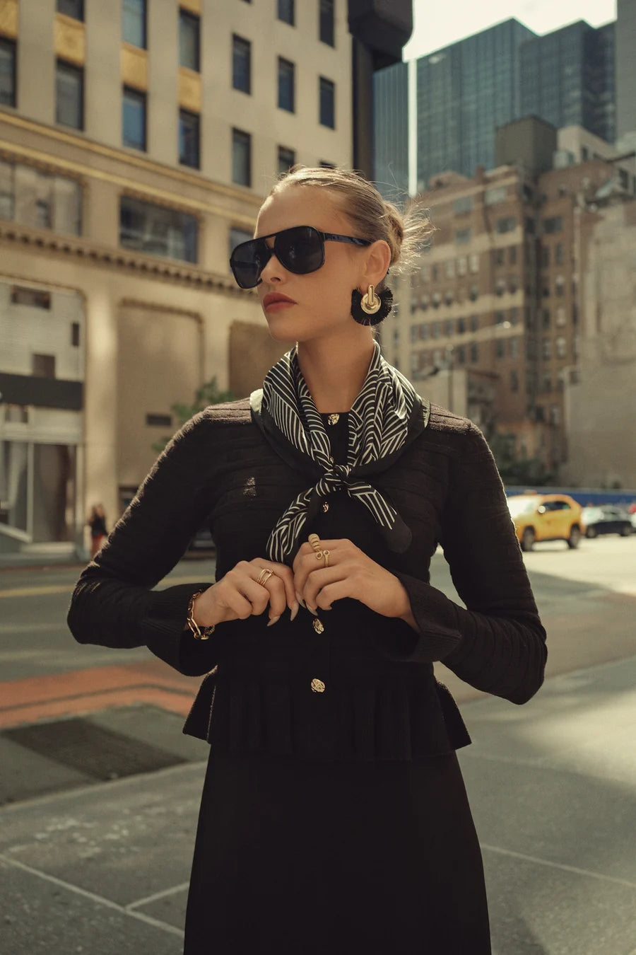BLACK PEPLUM CARDI